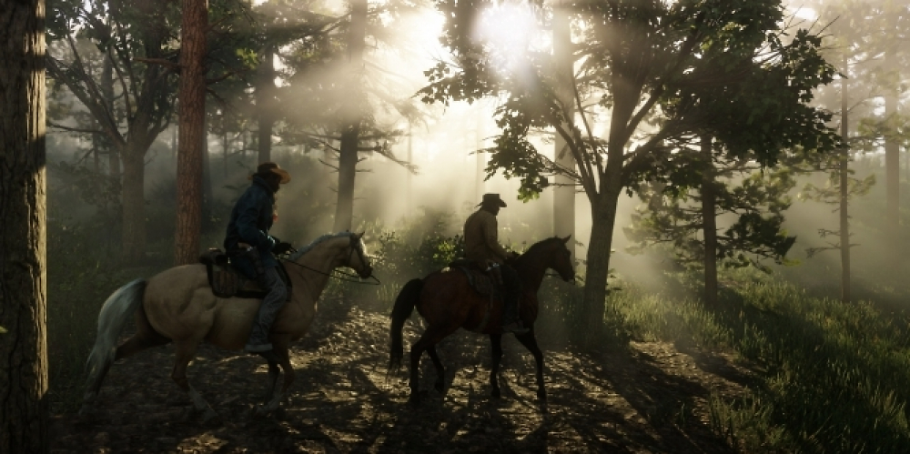 Screenshot aus Red Dead Redemption 2, der zwei Mitglieder der Van der Linde-Gang zeigt.