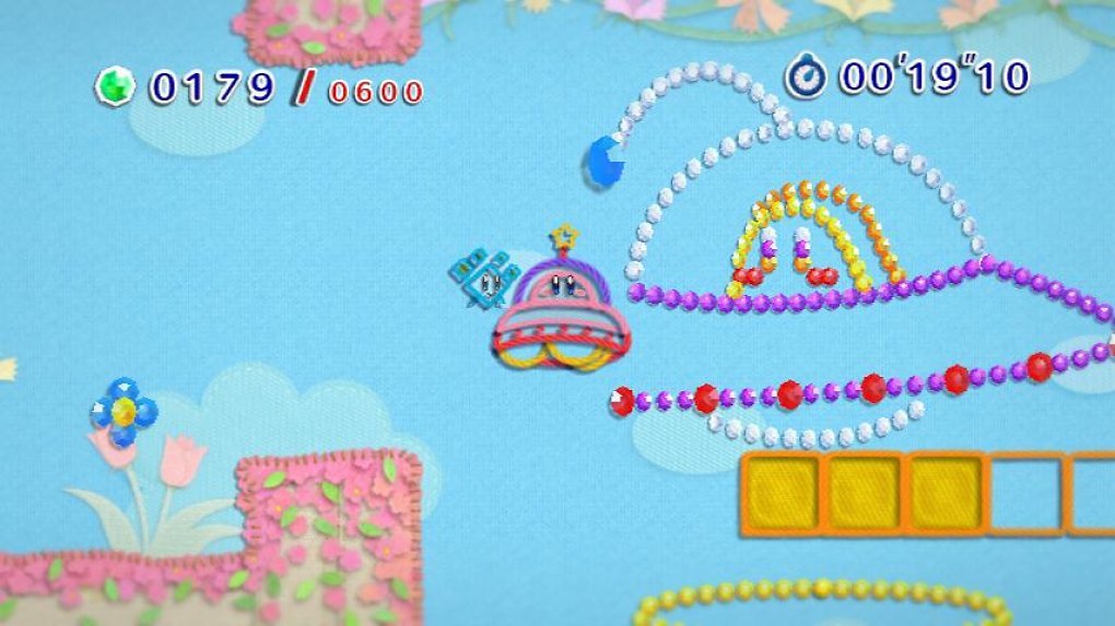 Kirby schwebt in UFO-Form über das Level.
