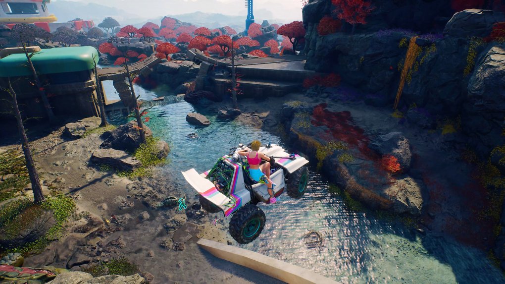 Ein Buggy springt über einen Fluss