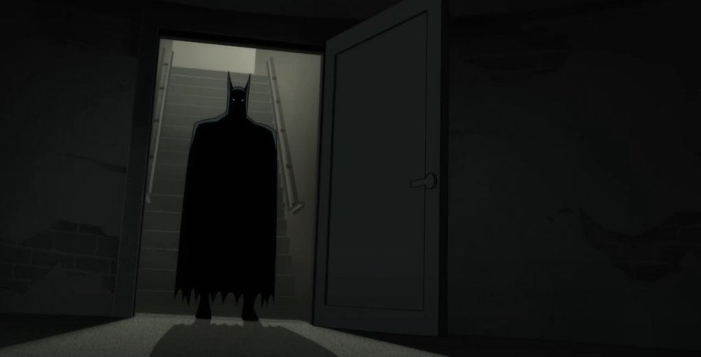 Batman betritt einen dunklen Raum