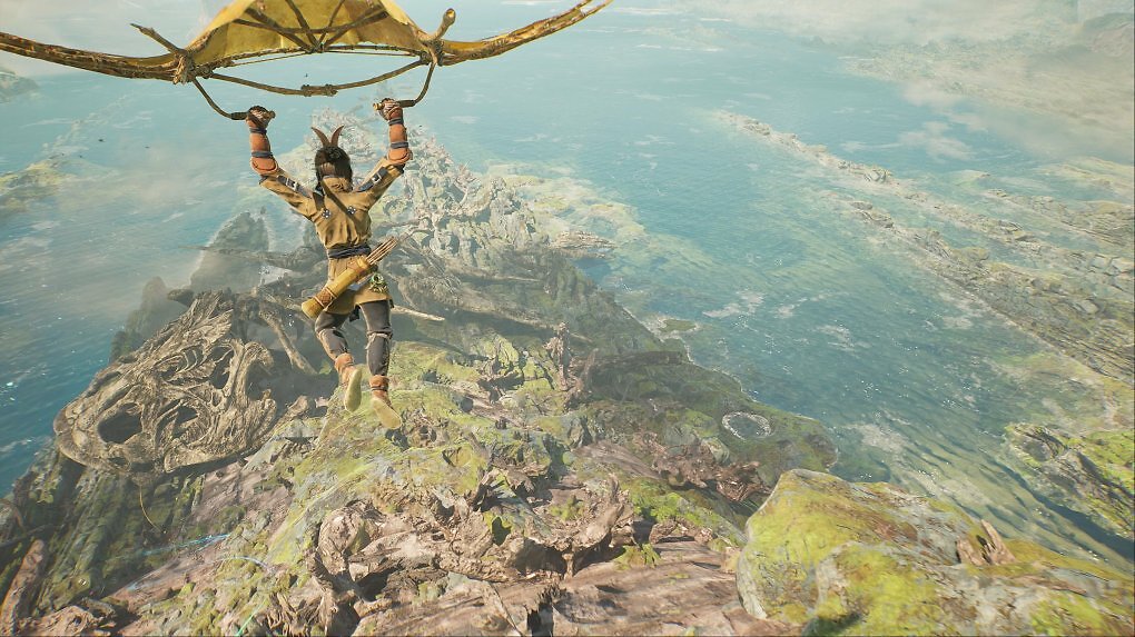 Ein Spieler gleitet mit einem Fallschirm über die Spielwelt von Towers of Aghasba