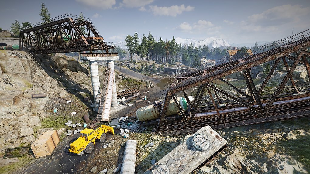 Ein Bulldozer steht in der Nähe einer eingestürzten Brücke