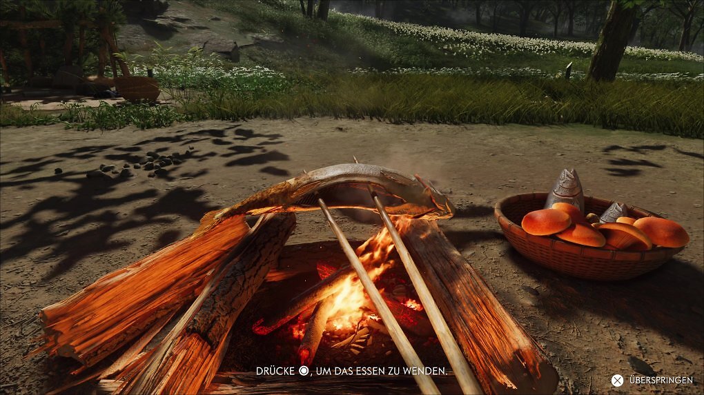 Am Lagerfeuer bereiten wir Pilze und Fische zu. Das Essen sorgt für einen vorübergehenden Fähigkeiten-Boost.