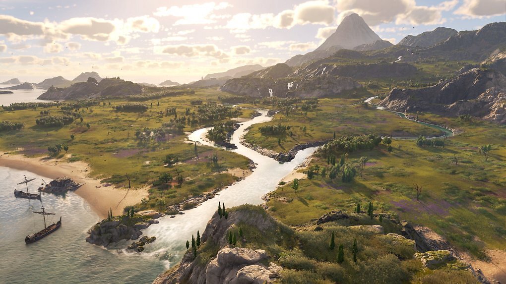 Eine grüne Insel, die von einem verzweigten Fluss durchzogen wird. Im Hintergrund ragt der Vulkan in den Himmel.