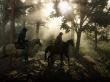 Screenshot aus Red Dead Redemption 2, der zwei Mitglieder der Van der Linde-Gang zeigt.
