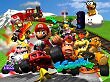 Gruppenbild von Mario-Charakteren auf ihren Karts.