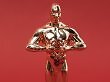 Bild zeigt eine Gold-Statue, ähnlich wie die Oscar-Trophäe.