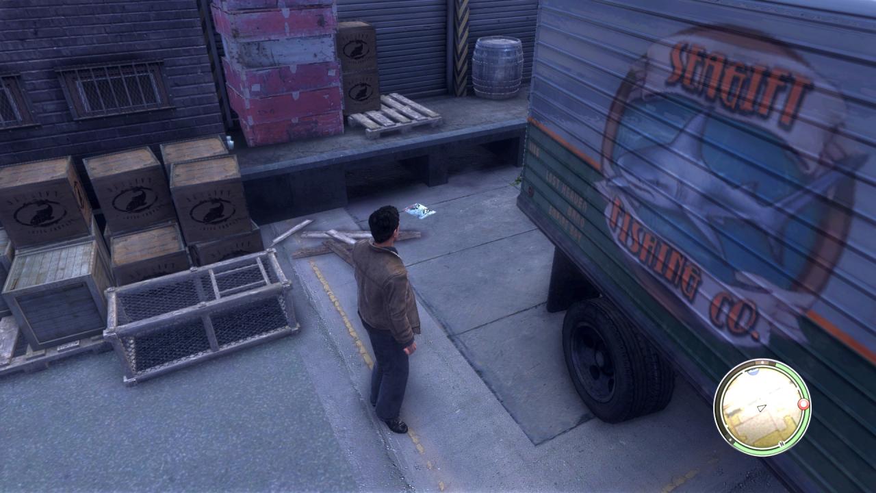 [24/08/2010] Kapitel 12 - Meeresgabe / Chapter 12 - Sea Gift: Auf dem Parkplatz der Fischfabrik: Das Heftchen liegt auf dem Pflaster, zwischen einem Lastwagen und der Laderampe.