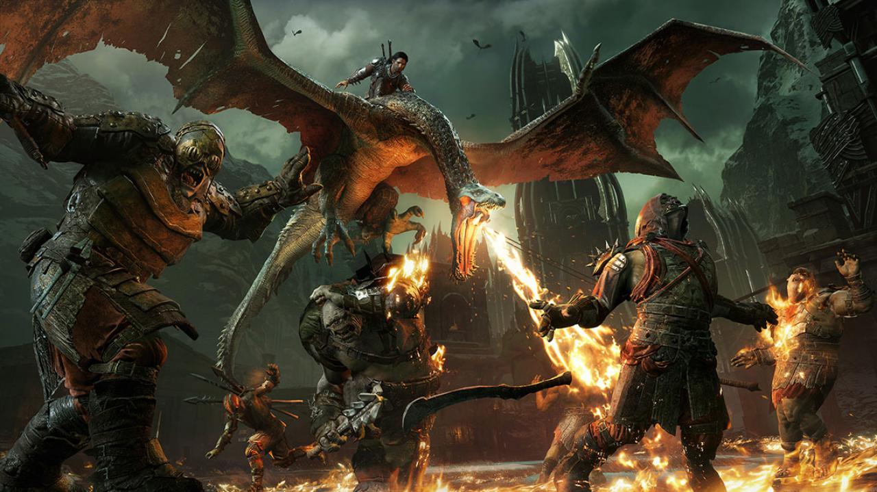 Ein Mann fliegt auf einem Feuer speienden Drachen. Fünf Orks am Boden stehen in Flammen.