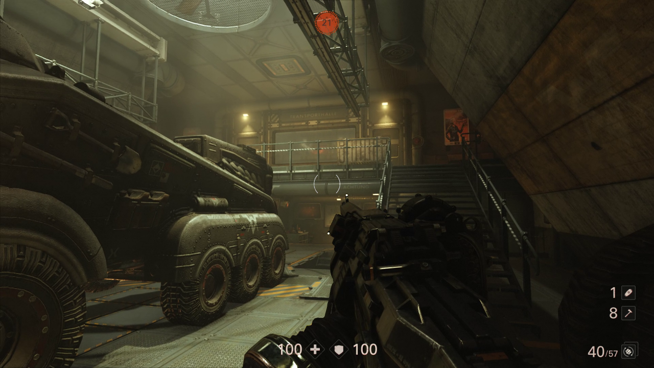 [08/11/2017] Wolfenstein 2: The New Colossus Im Venus-Level Transporthalle findet ihr hinter diesem Radpanzer den Zugang zum Versteck der Schlachtenläufer-Kampfmod.