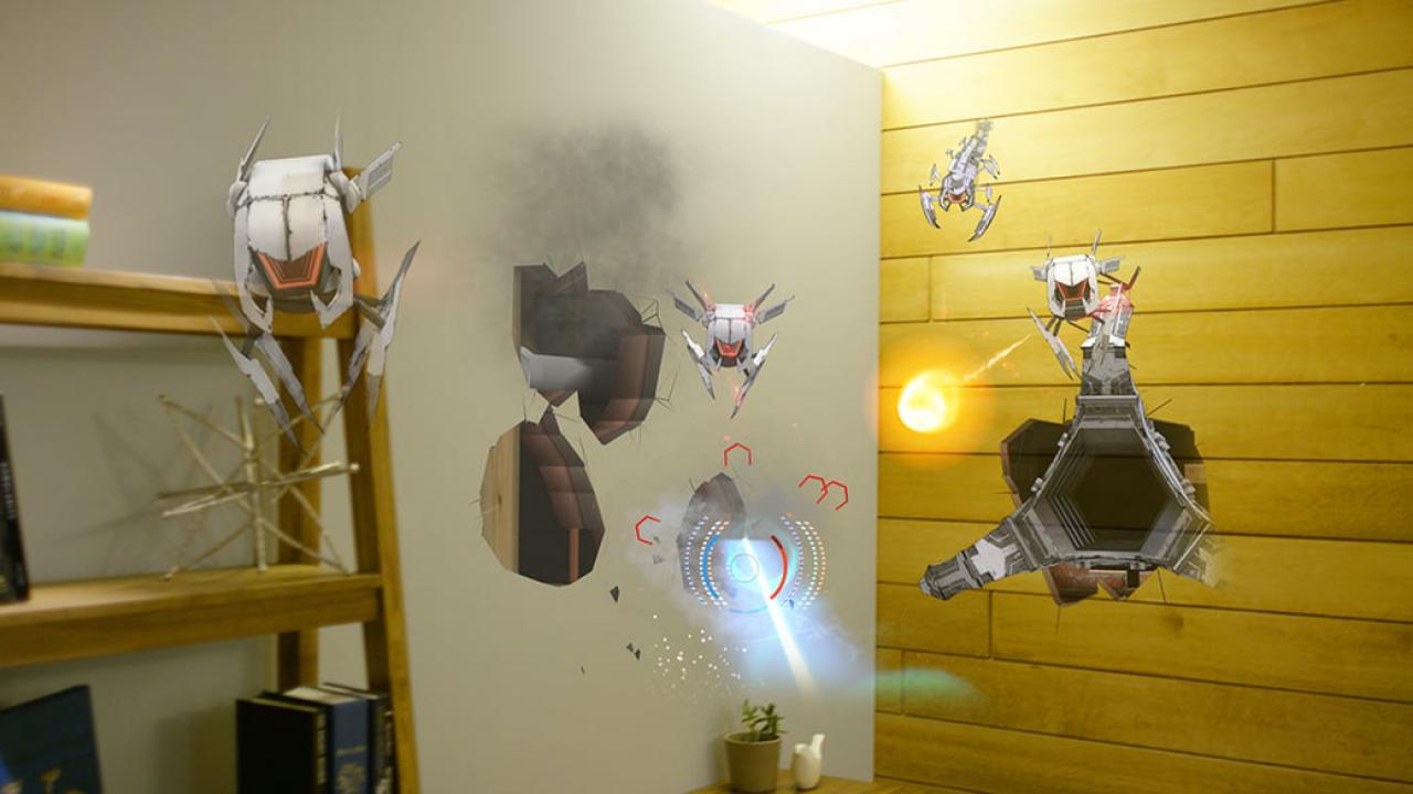 [27/03/2018] Ein echtes Wow-Erlebnis: In RoboRaid für HoloLens öffnen sich plötzlich Löcher in der Wand. Kurz darauf surren kleine Aliendrohnen ins Zimmer und greifen den Spieler mit Laserstrahlen an. (Quelle: Against Gravity)