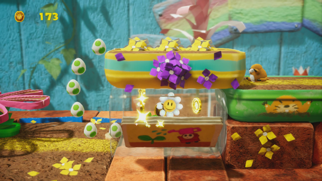 [28/03/2019] Yoshi's Crafted World: Welt 4 - Level 1: Blumenwippwiese: Blume Nummer 7 befindet sich in einem Glas unter der Plattform.