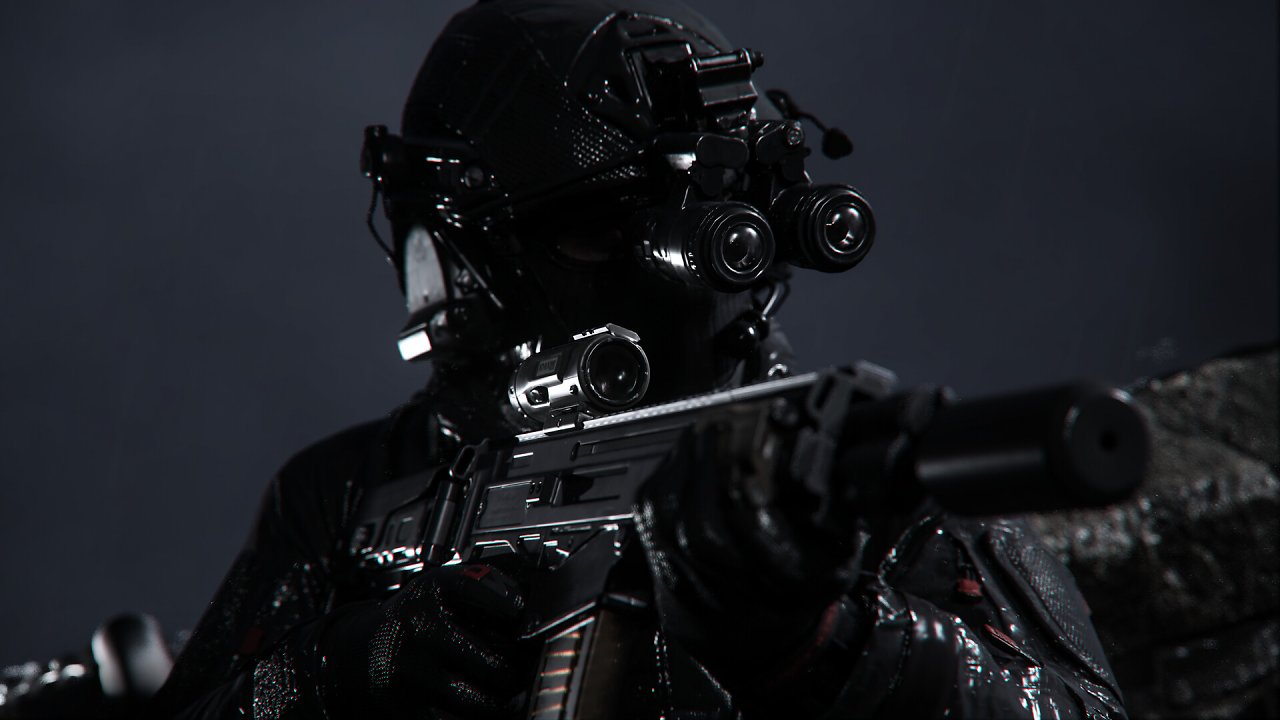 Soldat mit Nachtsichtgerät und Waffe zielt