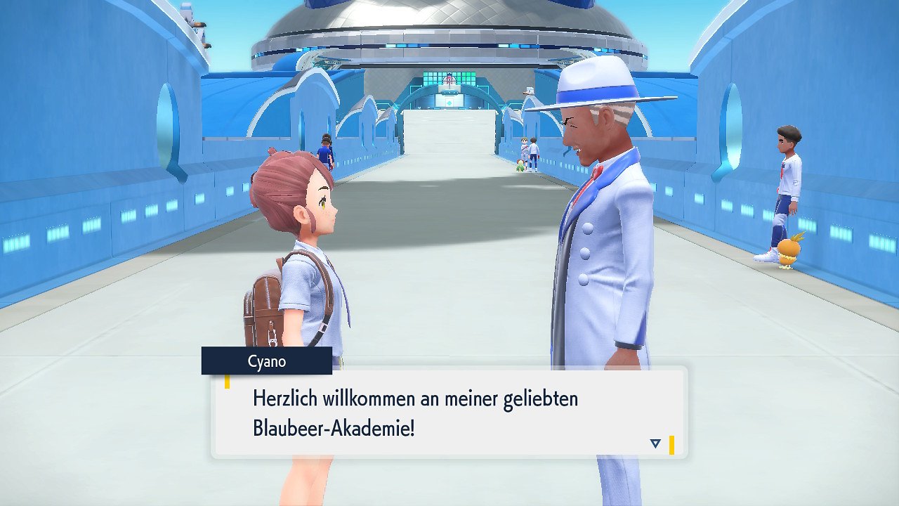 Direktor Cyano begrüßt die Hauptfigur an der Blaubeer-Akademie.
