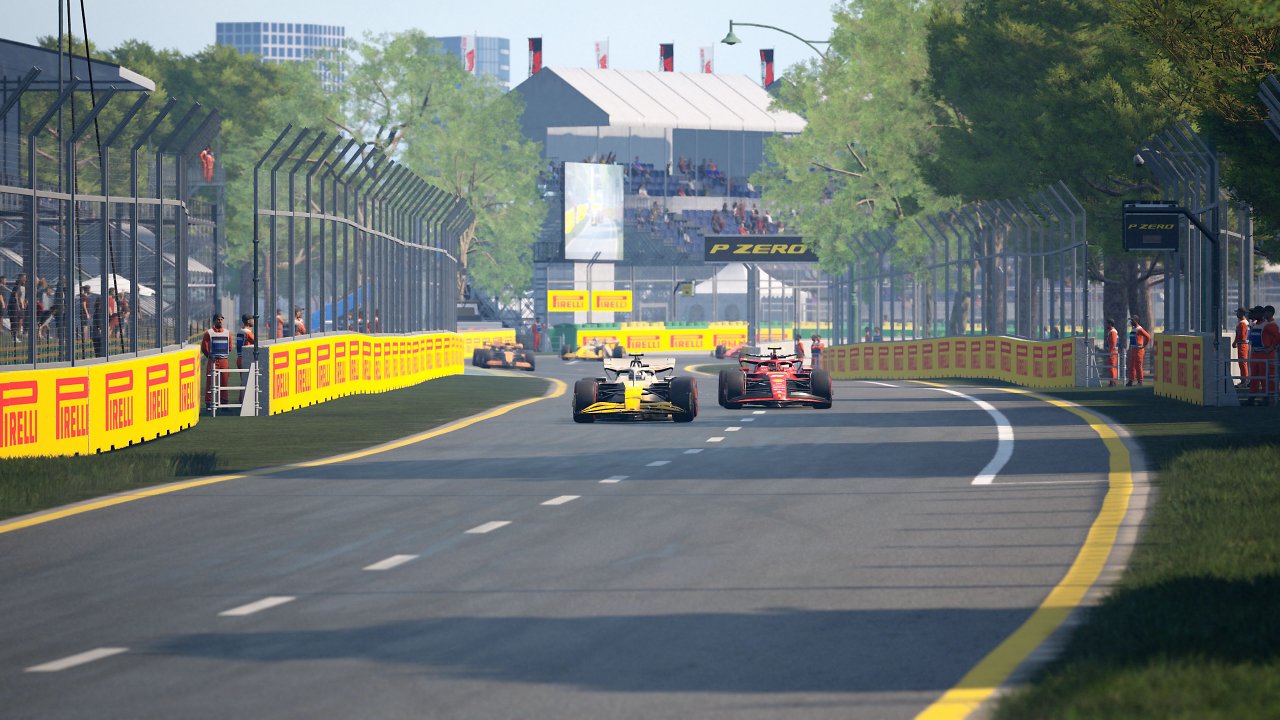Zwei F1-Fahrzeuge kämpfen auf einer Geraden in Melbourne um Positionen.
