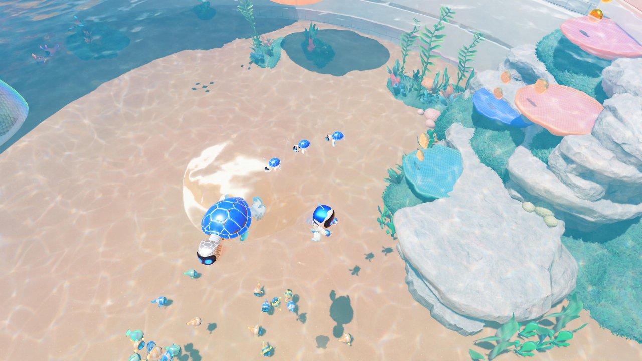 Astro Bot schwimmt neben ein paar Schildkröten