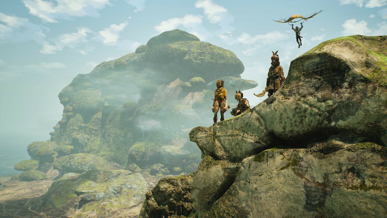Spieler stehen auf einem Felsen in Towers of Aghasba
