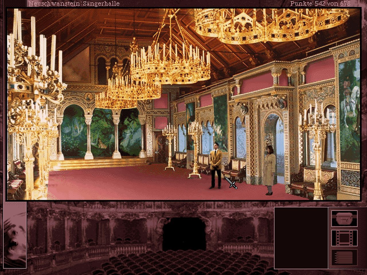 [13/10/2025] Grace lenkt im Sängersaal von Schloss Neuschwanstein einen Wächter ab. In einem Geheimfach findet sie einen Teil der verschollenen Wagner-Oper.&nbsp;