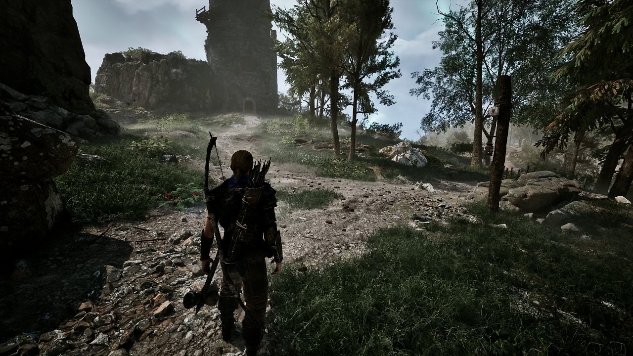 Der Protagonist blickt auf einen Turm an einer Klippe.