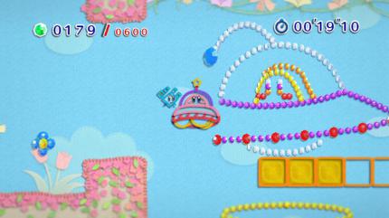 Kirby schwebt in UFO-Form über das Level.