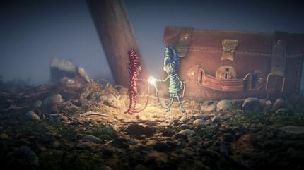 Yarny trifft seinen wolligen blauen Begleiter. Aussehen und Farbe der Spielfiguren lässt sich ändern.