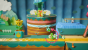 Yoshi's Crafted World: Welt 2 - Level 1: Schnuffel auf der Rolle: In diesem Geschenk im Hintergrund befinden sich rote Münzen - abschießen!