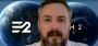 Shane Isaac tritt immer wieder in unscharfen Videos auf, um Earth 2 zu bewerben. Dabei ist wichtig zu erwähnen, dass er weder Erfahrung im Videospiele-Sektor noch im Bereich eines derartig titanischen Projektmanagements hat.